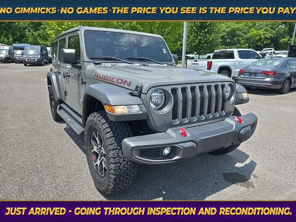 2021 Jeep Wrangler Unlimited Rubicon in Sting-Gray Clearcoat — front three-quarter view