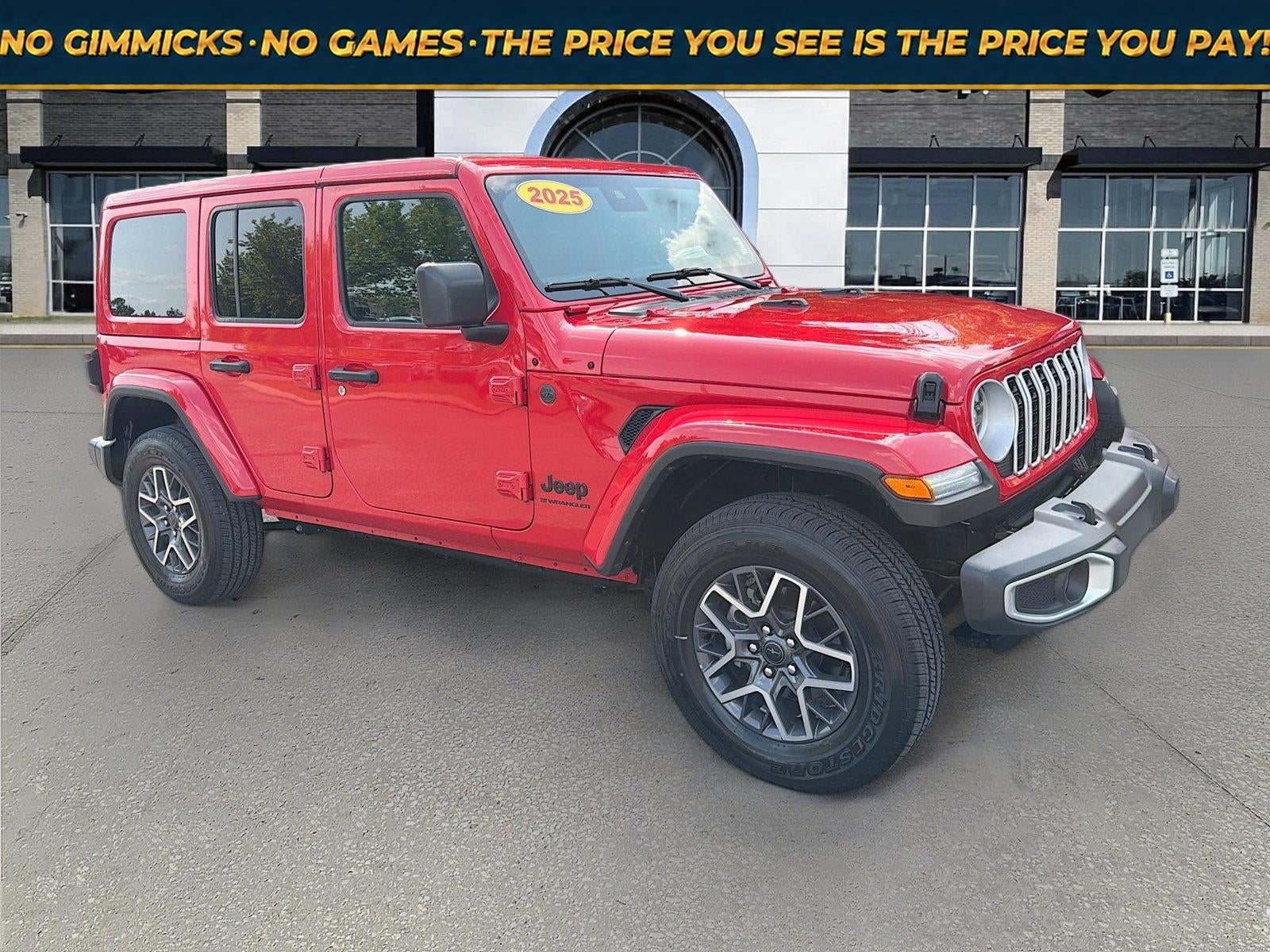 2025 Jeep Wrangler 4-Door Sahara 4x4 in Firecracker Red Clearcoat — front three-quarter view