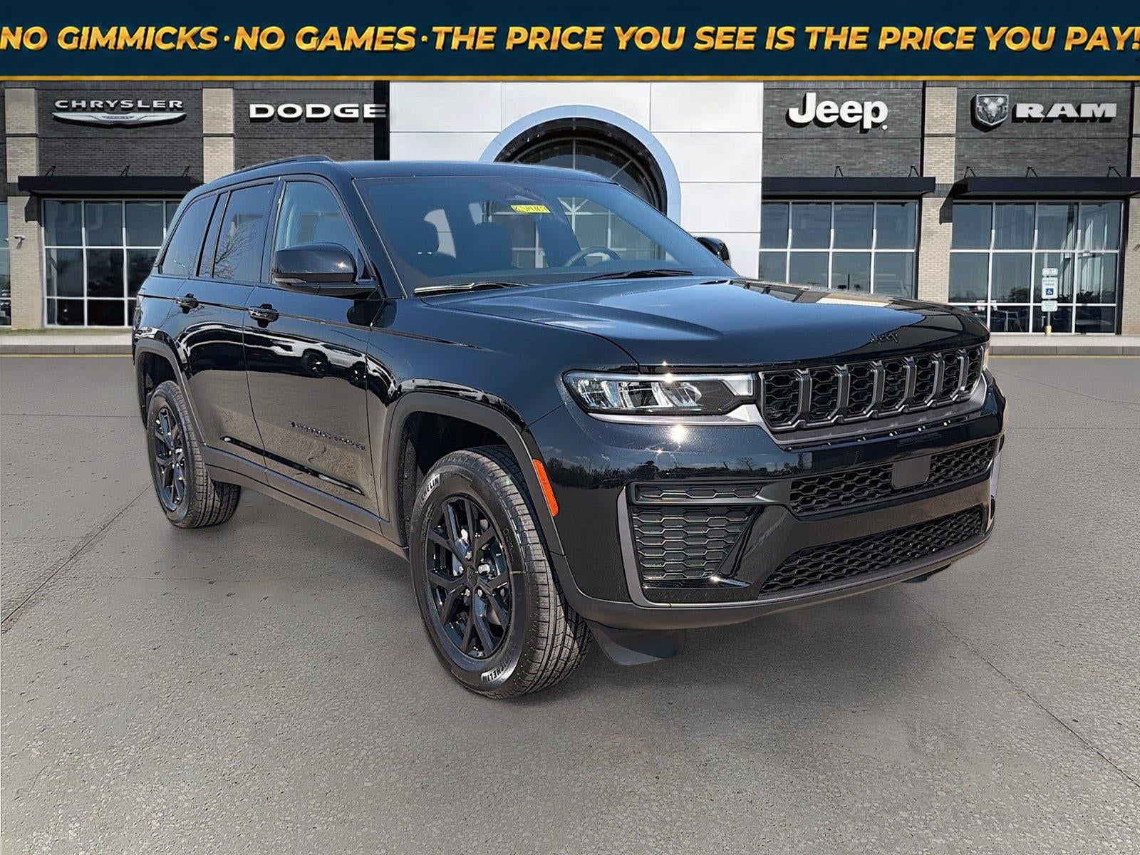 2026 Jeep Grand Cherokee GRAND CHEROKEE LAREDO ALTITUDE 4X4 in Diamond Black Crystal Pearl-Coat Exterior Paint — front three-quarter view