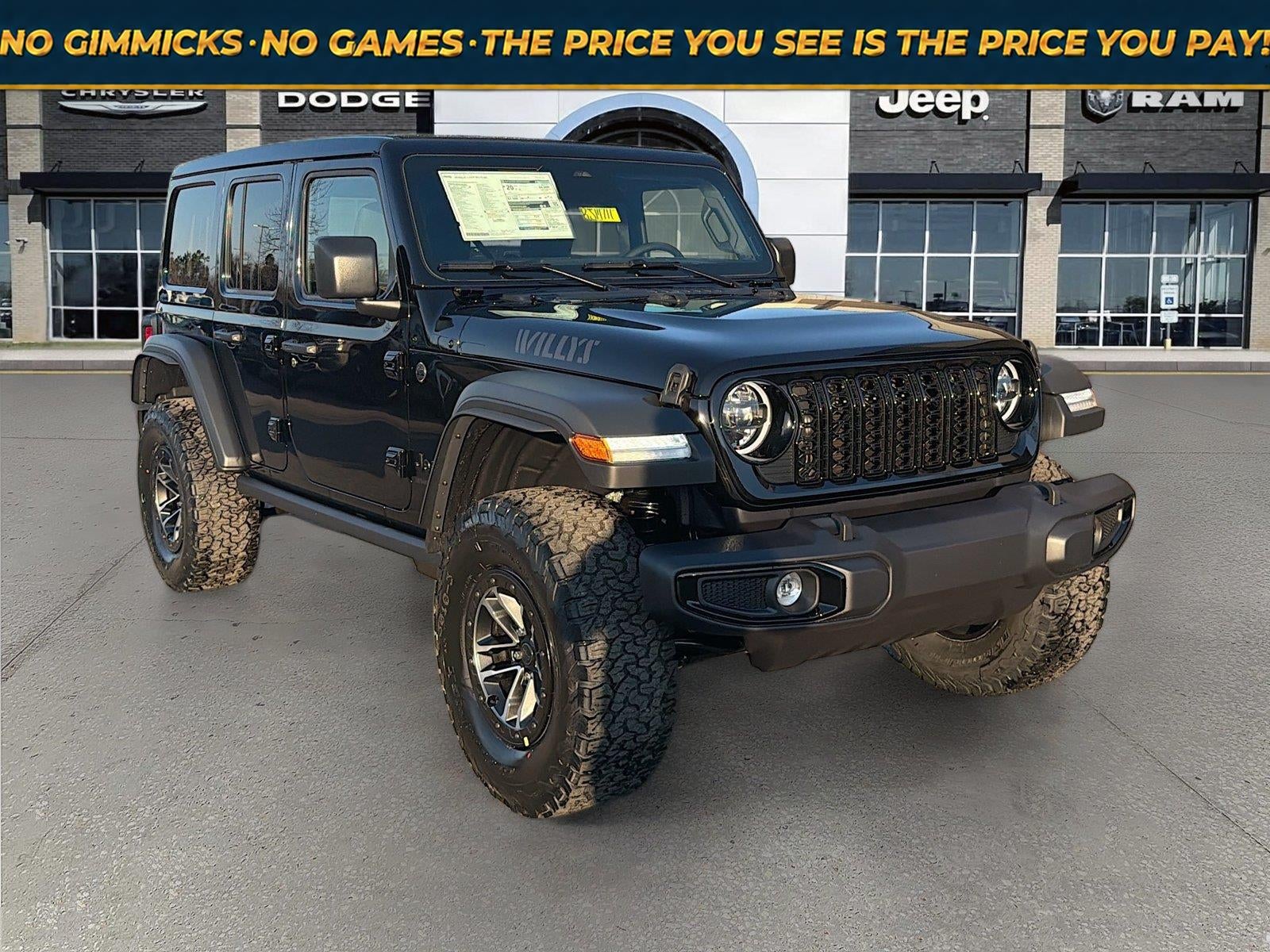 2026 Jeep Wrangler WRANGLER 4-DOOR WILLYS in Black Clear-Coat Exterior Paint — front three-quarter view