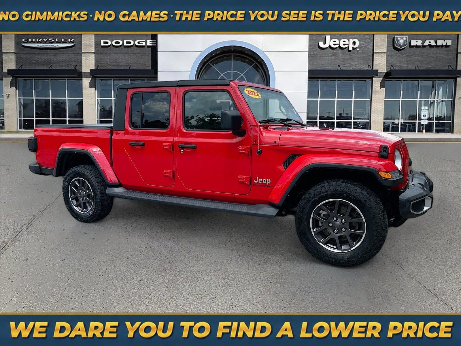 2022 Jeep Gladiator Overland 4x4 in Firecracker Red Clearcoat — front three-quarter view