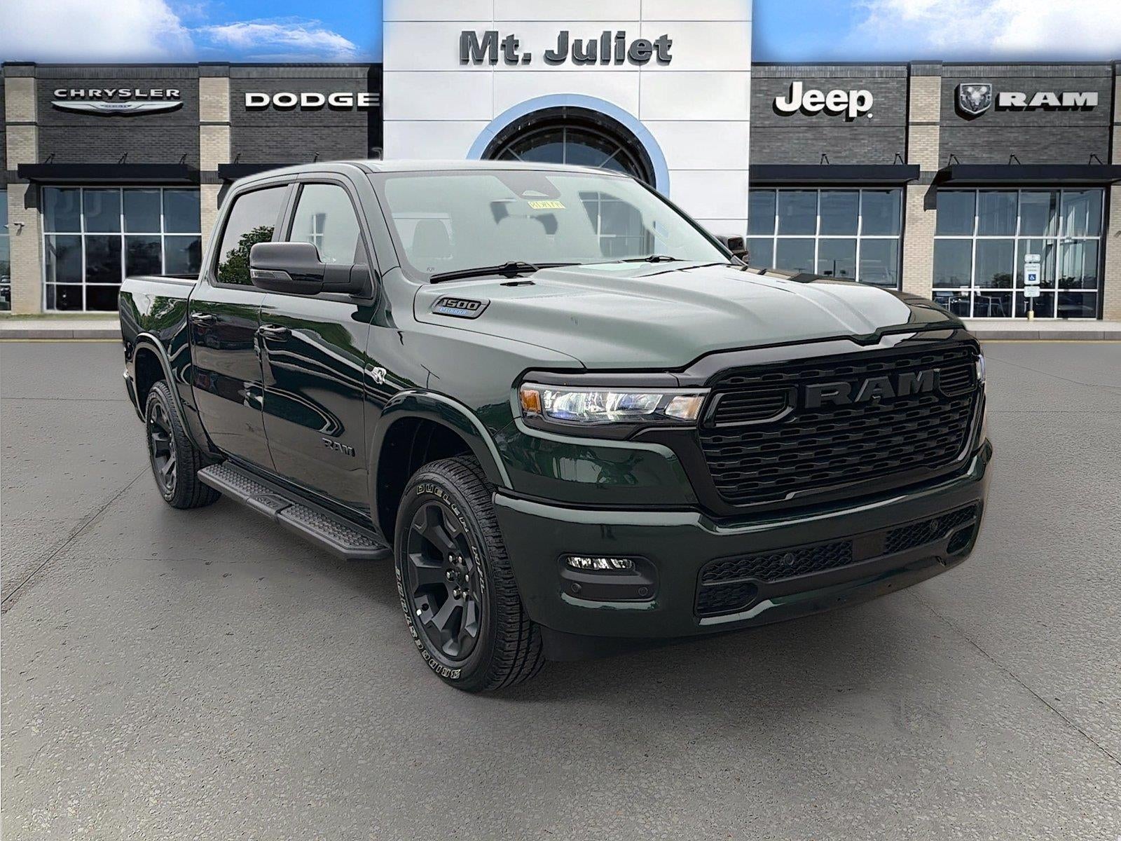 2026 RAM Ram 1500 RAM 1500 BIG HORN CREW CAB 4X4 5'7' BOX in Serrano-Green Metallic Exterior Paint — front three-quarter view
