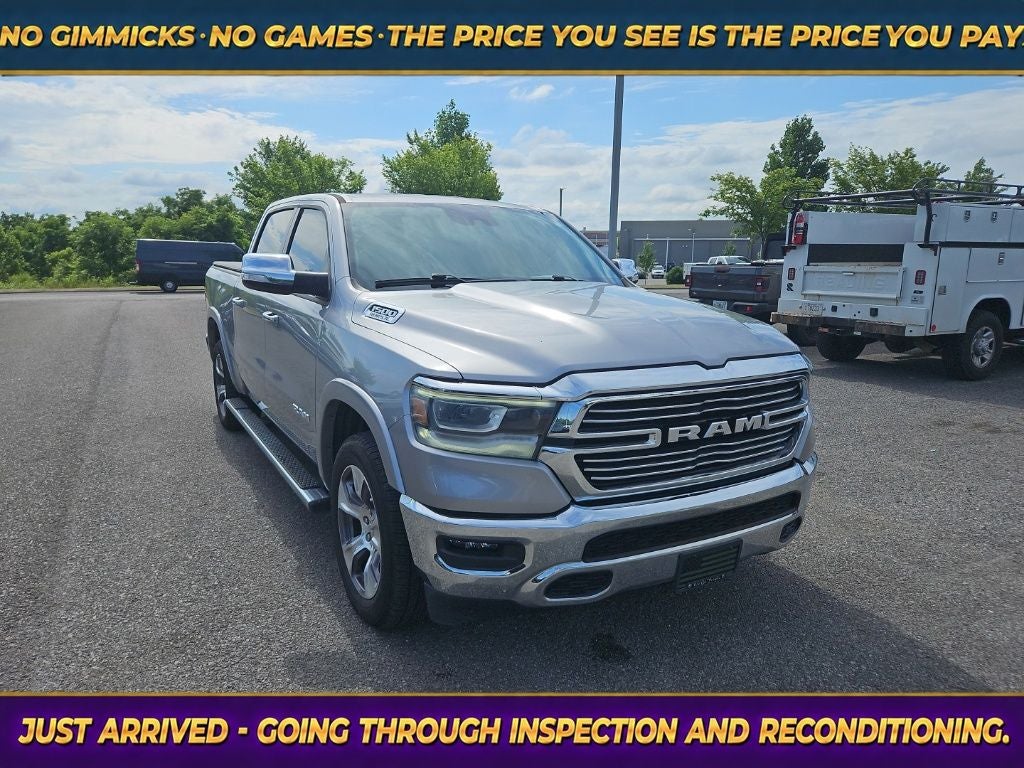 2021 RAM 1500 Laramie Crew Cab 4x4 5'7' Box in Billet Silver Metallic Clearcoat — front three-quarter view