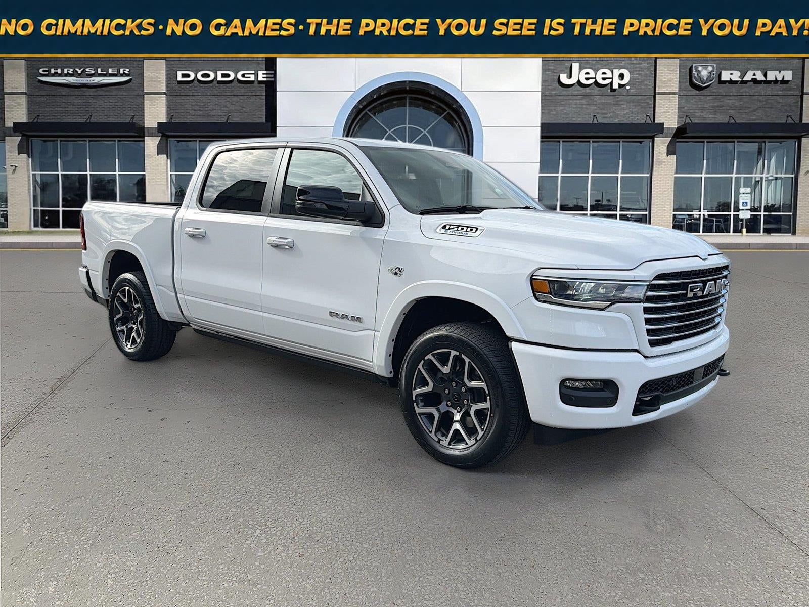 2026 RAM Ram 1500 RAM 1500 LARAMIE CREW CAB 4X4 5'7' BOX in Bright White Clear-Coat Exterior Paint — front three-quarter view