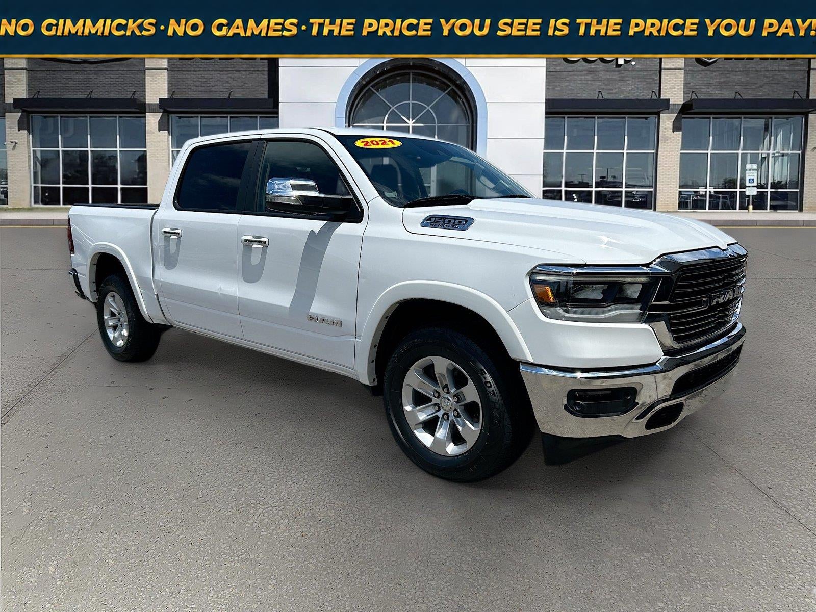 2021 RAM 1500 Laramie Crew Cab 4x4 5'7' Box in Bright White Clearcoat — front three-quarter view