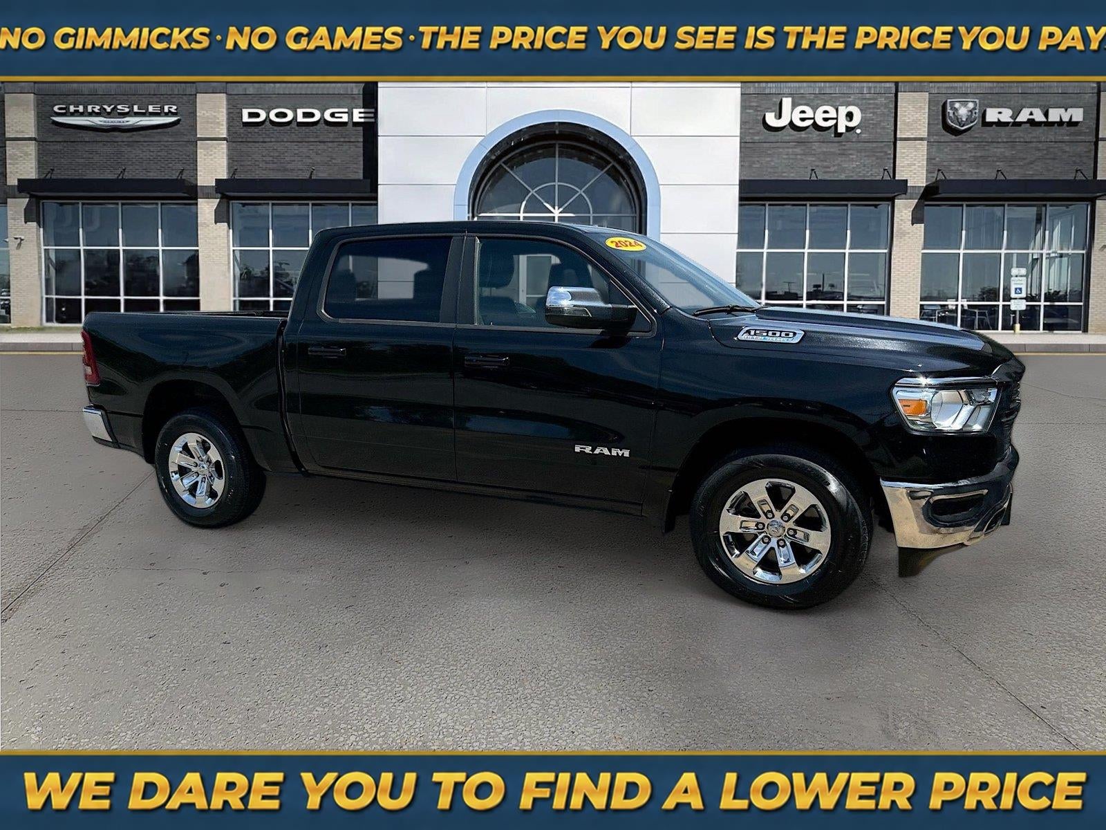 2024 RAM 1500 Laramie in Diamond Black — front three-quarter view