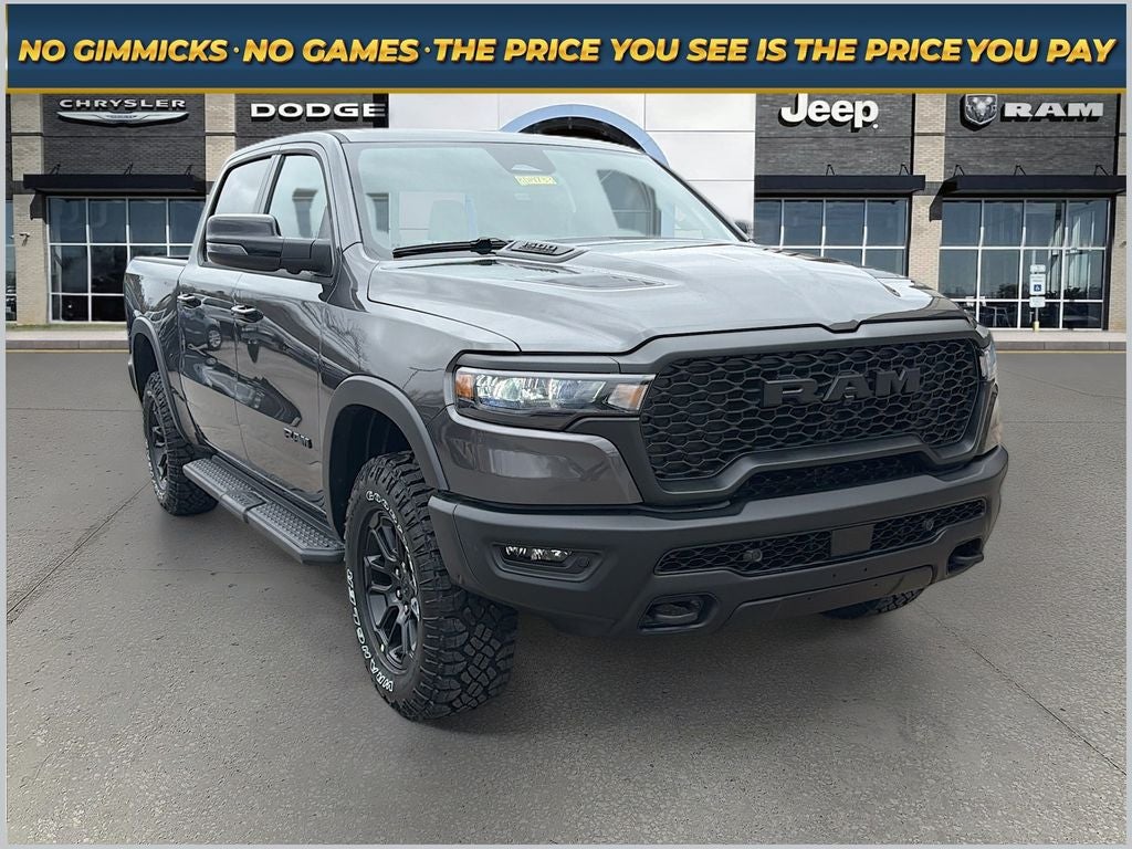 2026 RAM Ram 1500 RAM 1500 REBEL CREW CAB 4X4 5'7' BOX in Granite Crystal Metallic Clear-Coat Exterior Paint — front three-quarter view