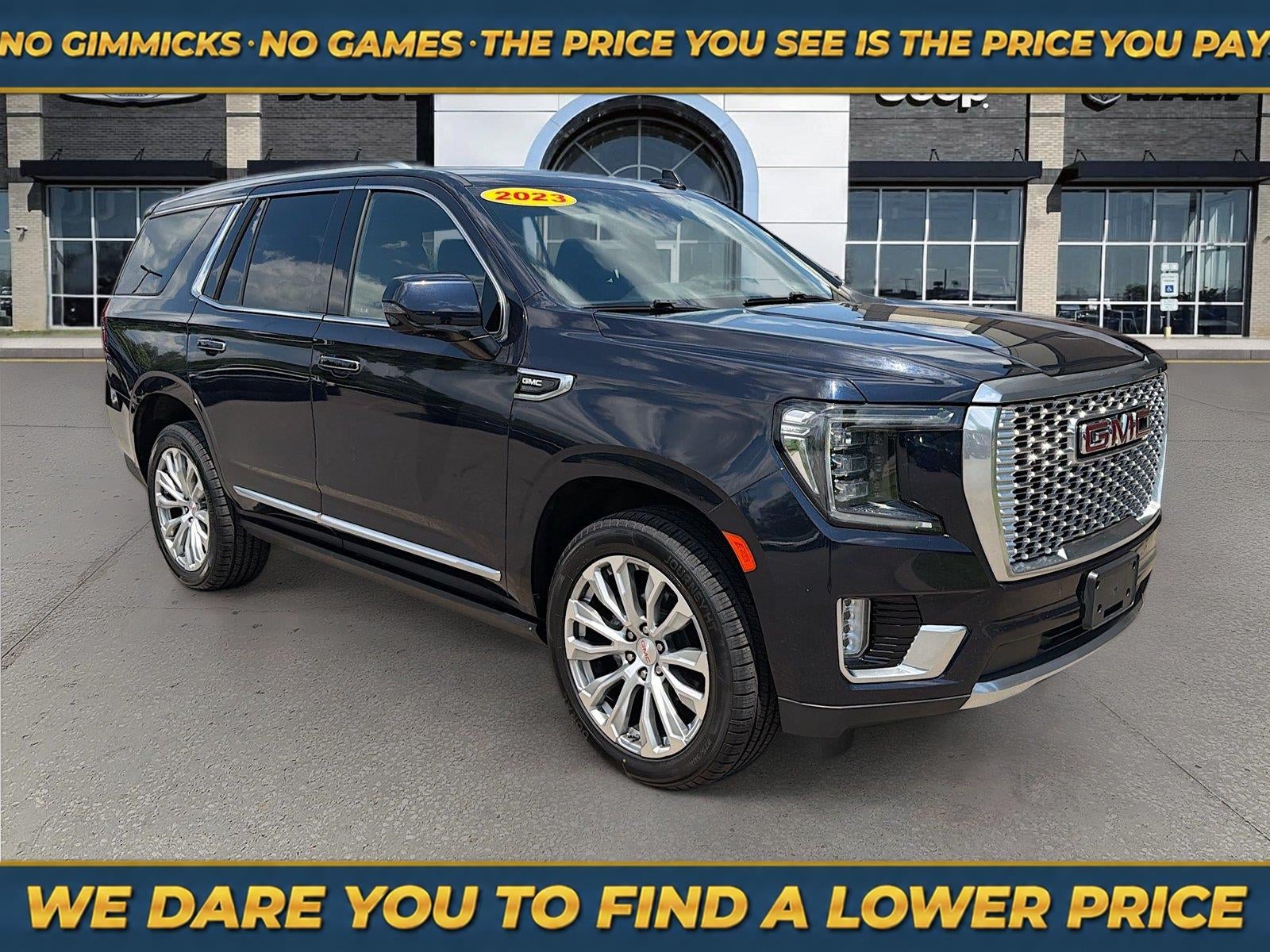 2023 GMC Yukon 4WD Denali in Midnight Blue Metallic — front three-quarter view