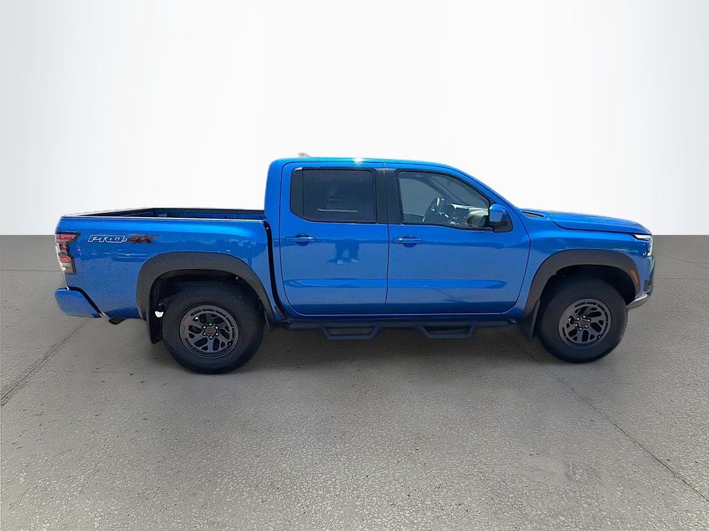 2025 Nissan Frontier — rear three-quarter view