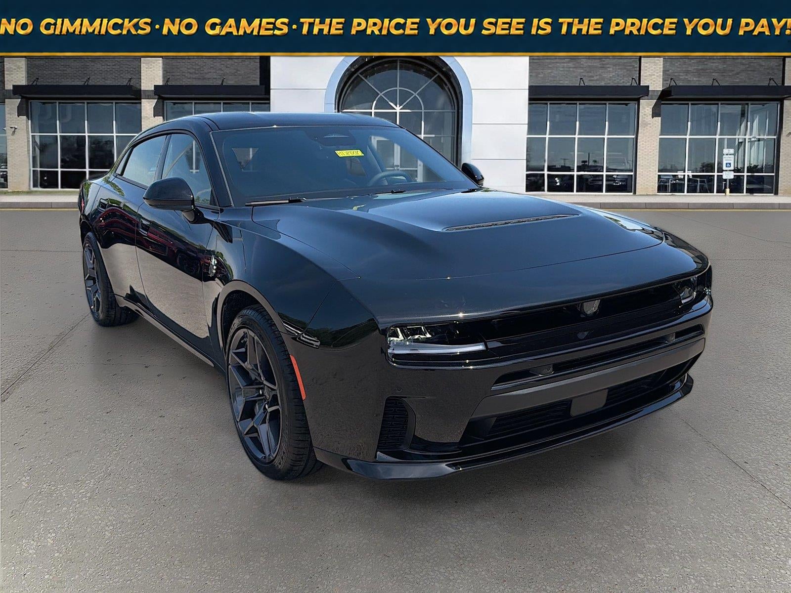 2026 Dodge Charger CHARGER SCAT PACK 4-DOOR AWD in Diamond Black Crystal Pearlcoat — front three-quarter view