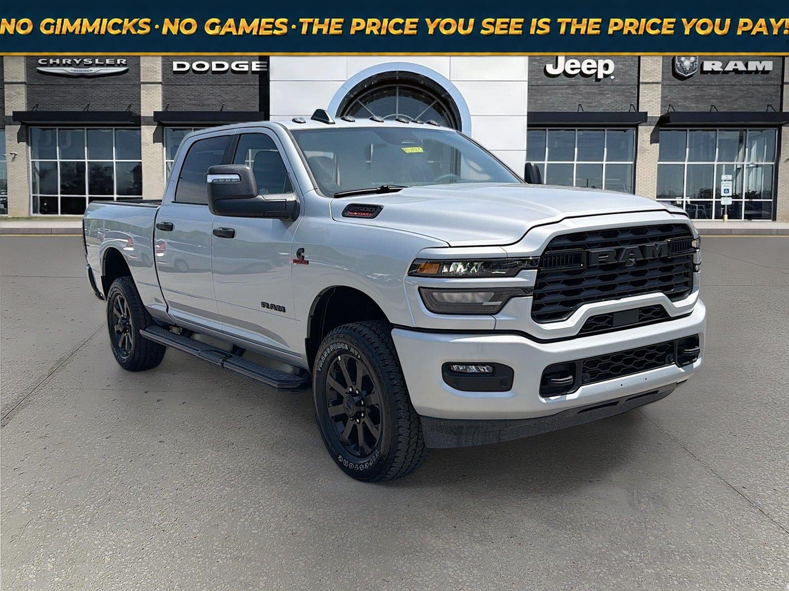 2026 RAM Ram 2500 RAM 2500 BIG HORN CREW CAB 4X4 6'4' BOX in Silver-Zynith Exterior Paint — front three-quarter view