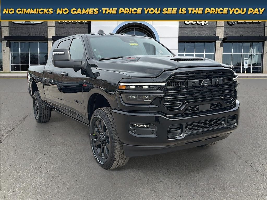 2026 RAM Ram 2500 RAM 2500 LARAMIE MEGA CAB 4X4 6'4' BOX in Diamond Black Crystal Pearl-Coat Exterior Paint — front three-quarter view