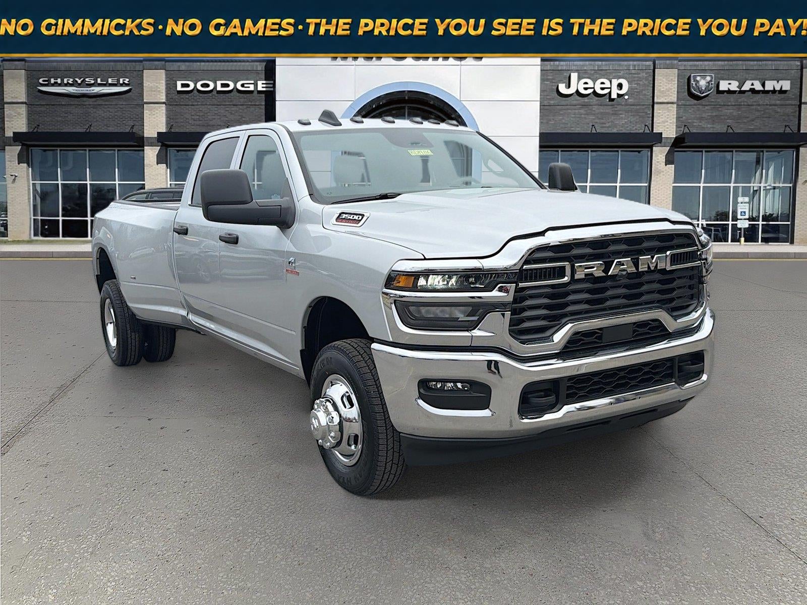 2026 RAM Ram 3500 RAM 3500 TRADESMAN CREW CAB 4X4 8' BOX in Silver-Zynith Exterior Paint — front three-quarter view