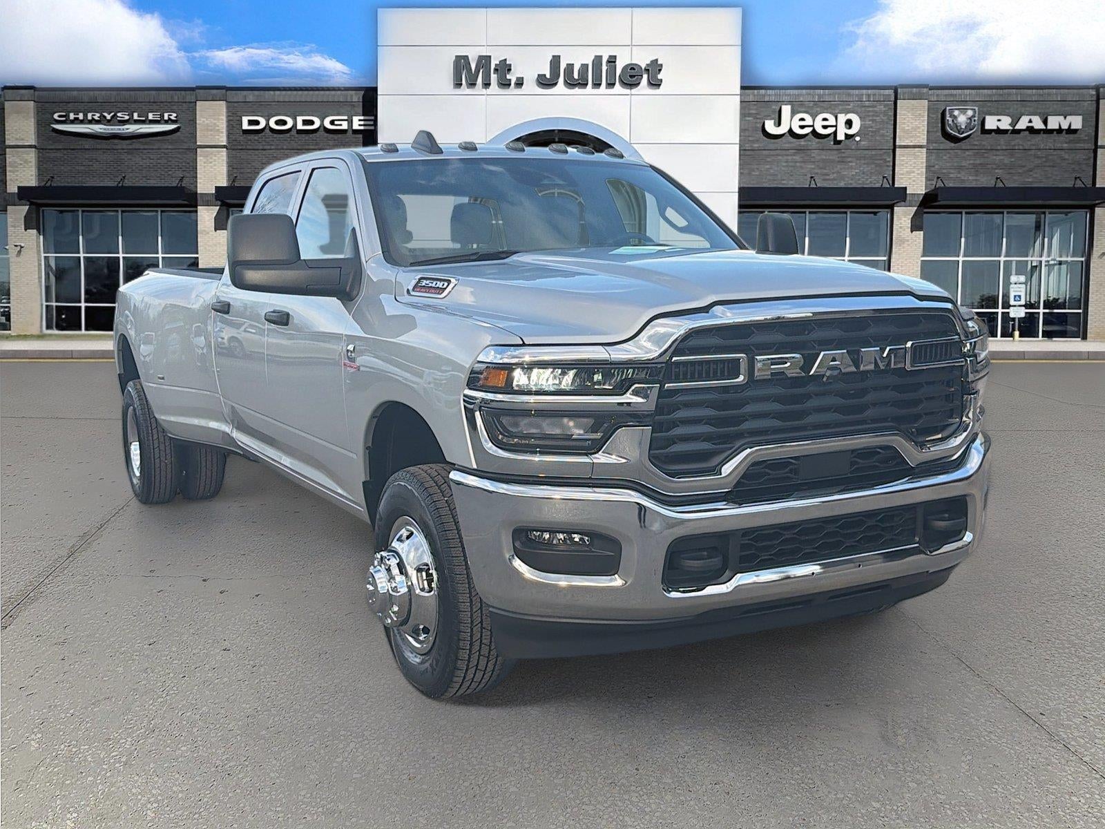 2026 RAM Ram 3500 RAM 3500 TRADESMAN CREW CAB 4X4 8' BOX in Silver-Zynith Exterior Paint — front three-quarter view