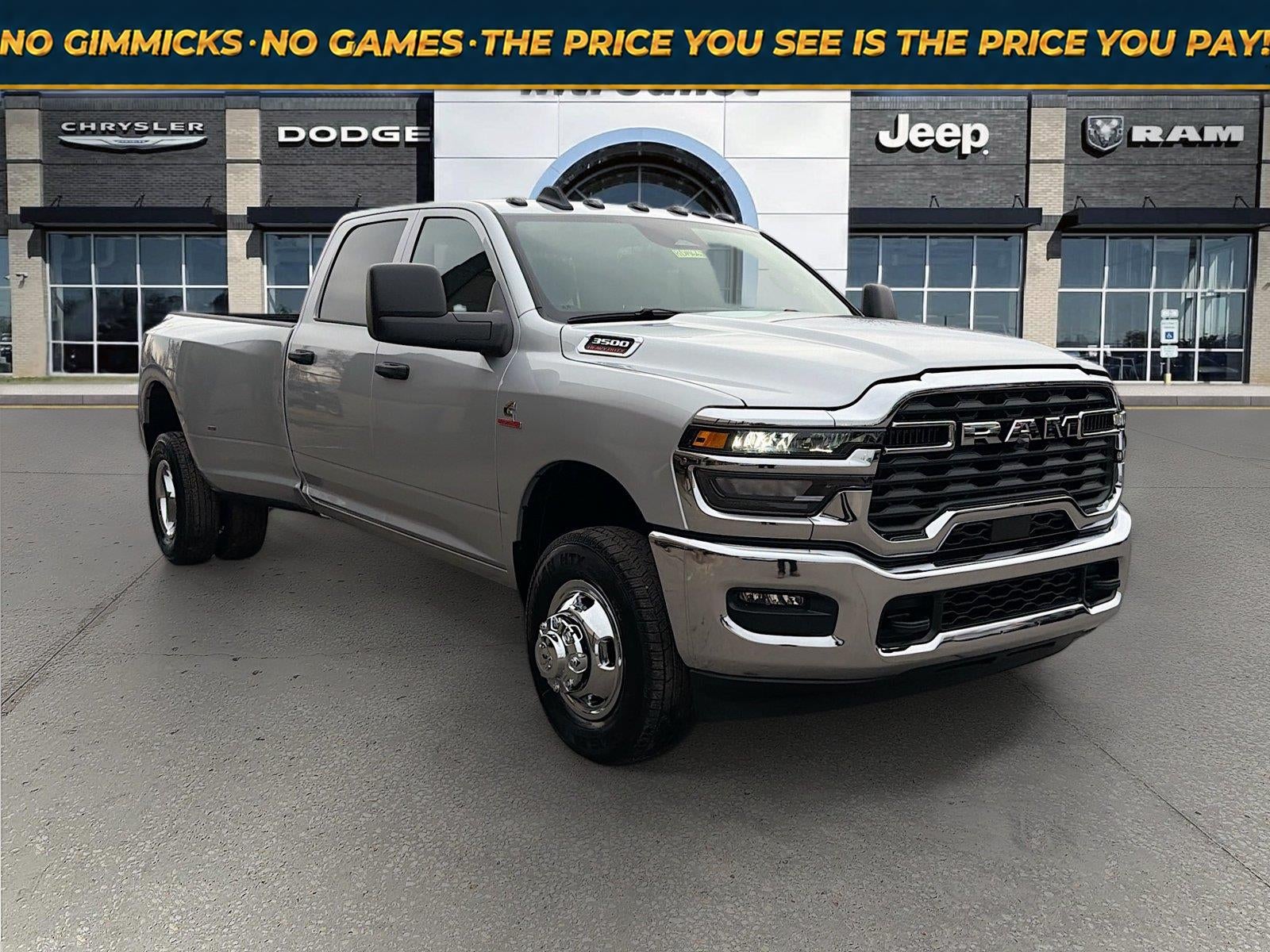 2026 RAM Ram 3500 RAM 3500 TRADESMAN CREW CAB 4X4 8' BOX in Silver-Zynith Exterior Paint — front three-quarter view