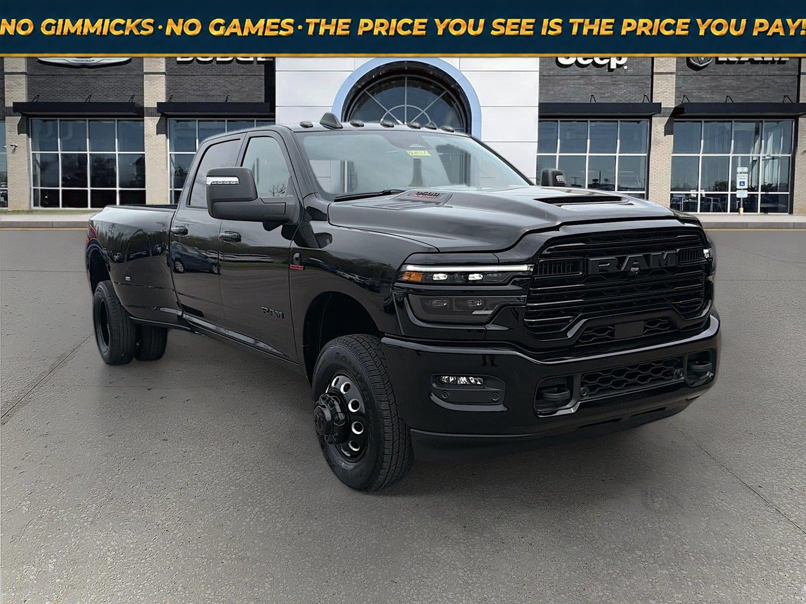 2026 RAM Ram 3500 RAM 3500 LARAMIE CREW CAB 4X4 8' BOX in Diamond Black Crystal Pearl-Coat Exterior Paint — front three-quarter view