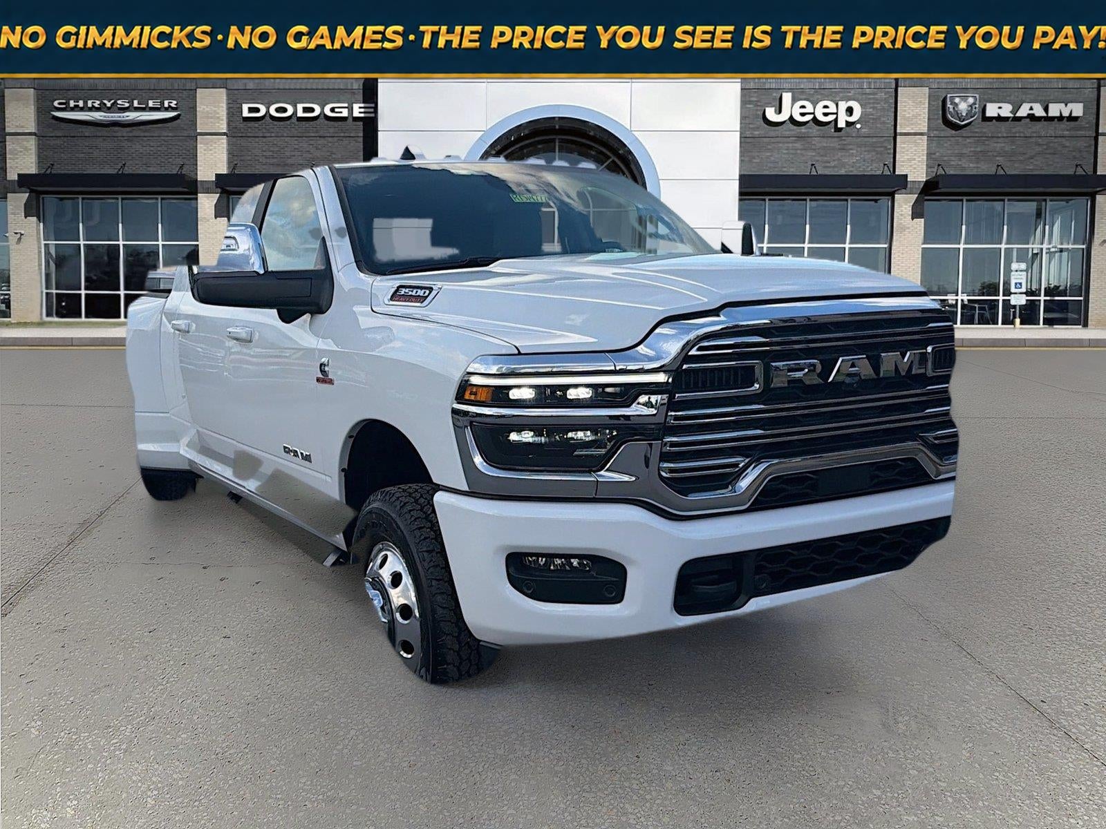2026 RAM Ram 3500 RAM 3500 LARAMIE MEGA CAB 4X4 6'4' BOX in Bright White Clear-Coat Exterior Paint — front three-quarter view