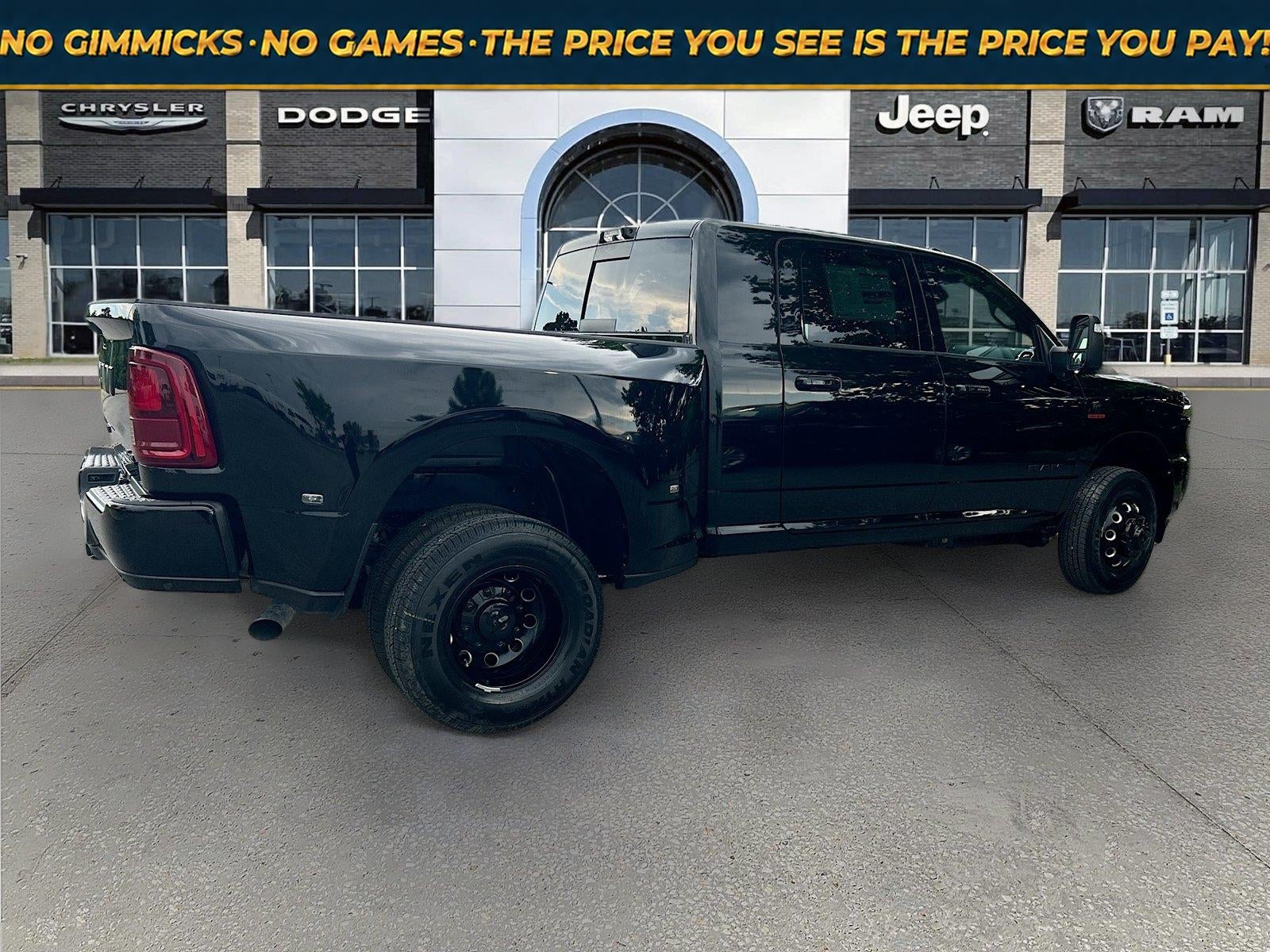 2026 RAM Ram 3500 RAM 3500 LARAMIE MEGA CAB 4X4 6'4' BOX in Diamond Black Crystal Pearl-Coat Exterior Paint — front three-quarter view