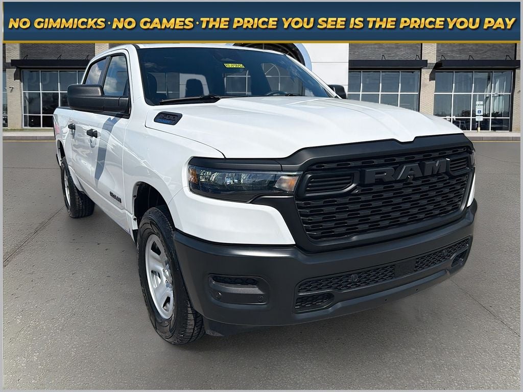 2026 RAM Ram 1500 RAM 1500 TRADESMAN CREW CAB 4X4 5'7' BOX in Bright White Clear-Coat Exterior Paint — front three-quarter view