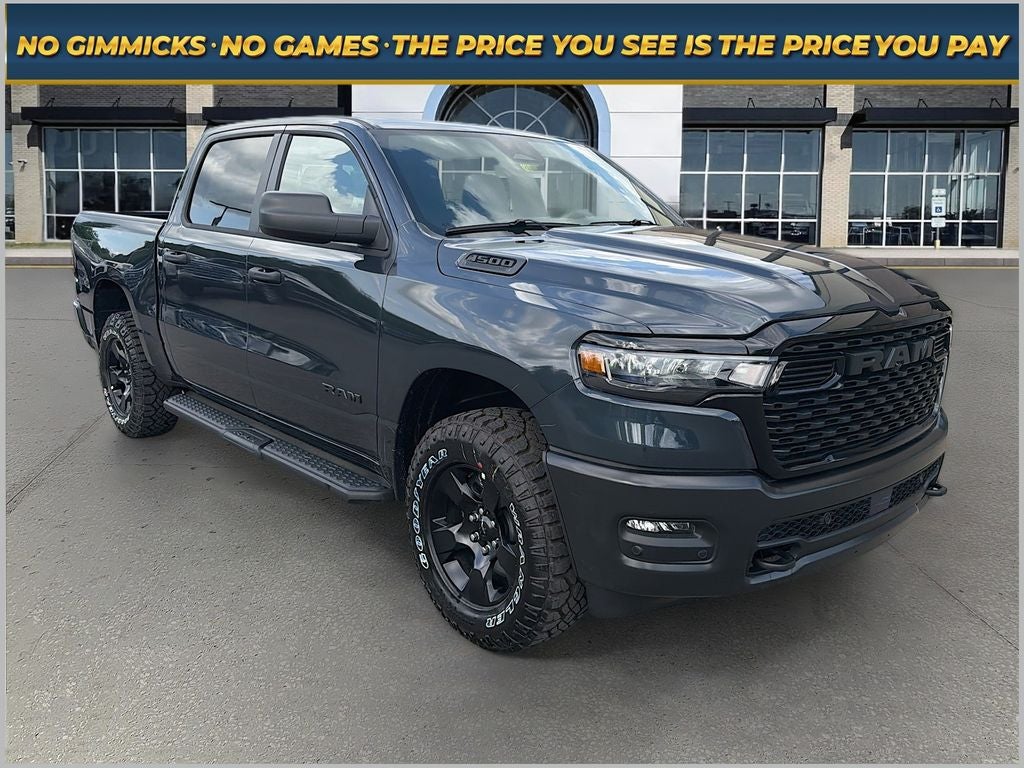 2026 RAM Ram 1500 RAM 1500 WARLOCK CREW CAB 4X4 5'7' BOX in Forged Blue Metallic Exterior Paint — front three-quarter view