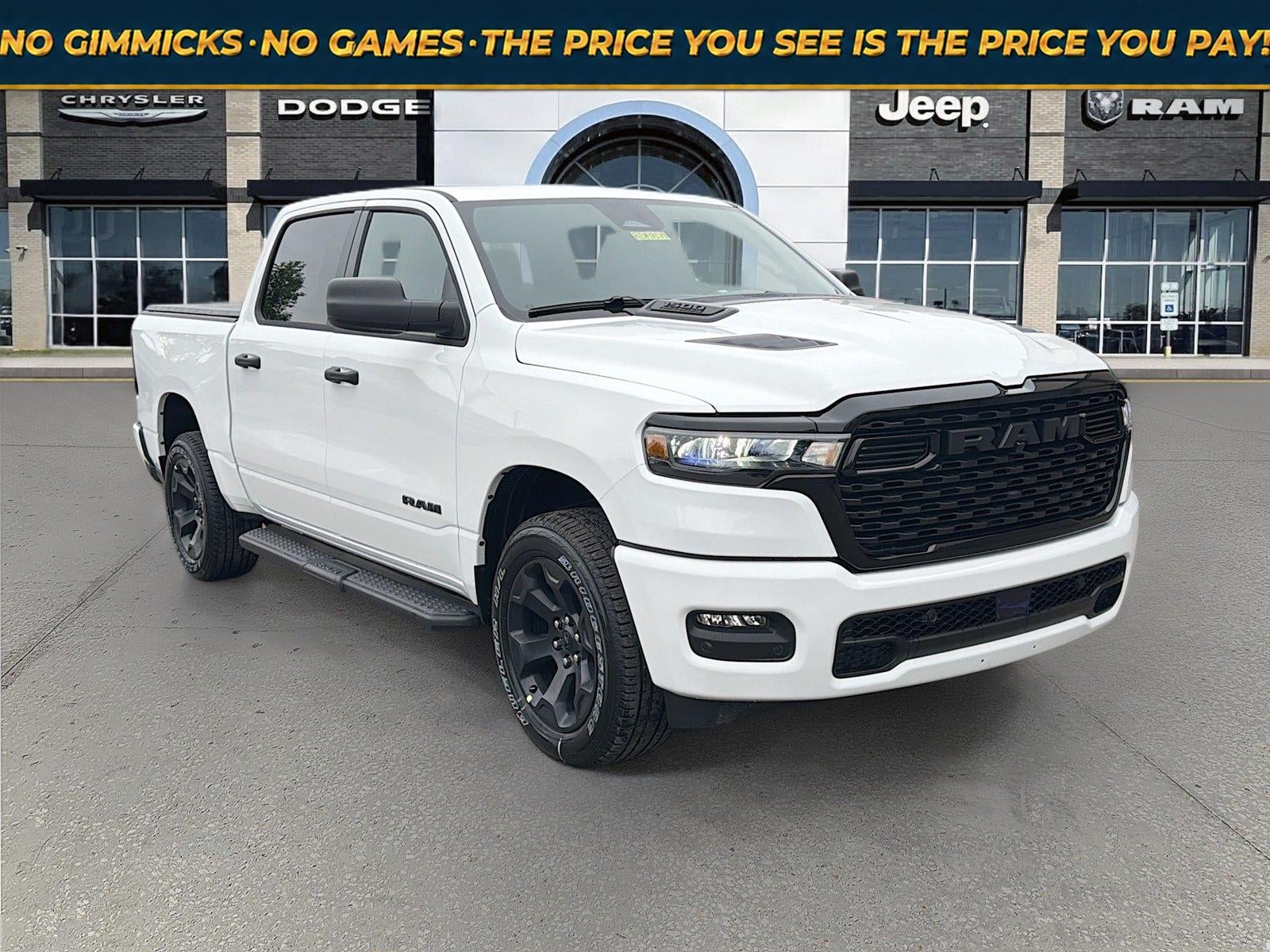 2026 RAM Ram 1500 RAM 1500 EXPRESS CREW CAB 4X4 5'7' BOX in Bright White Clear-Coat Exterior Paint — front three-quarter view