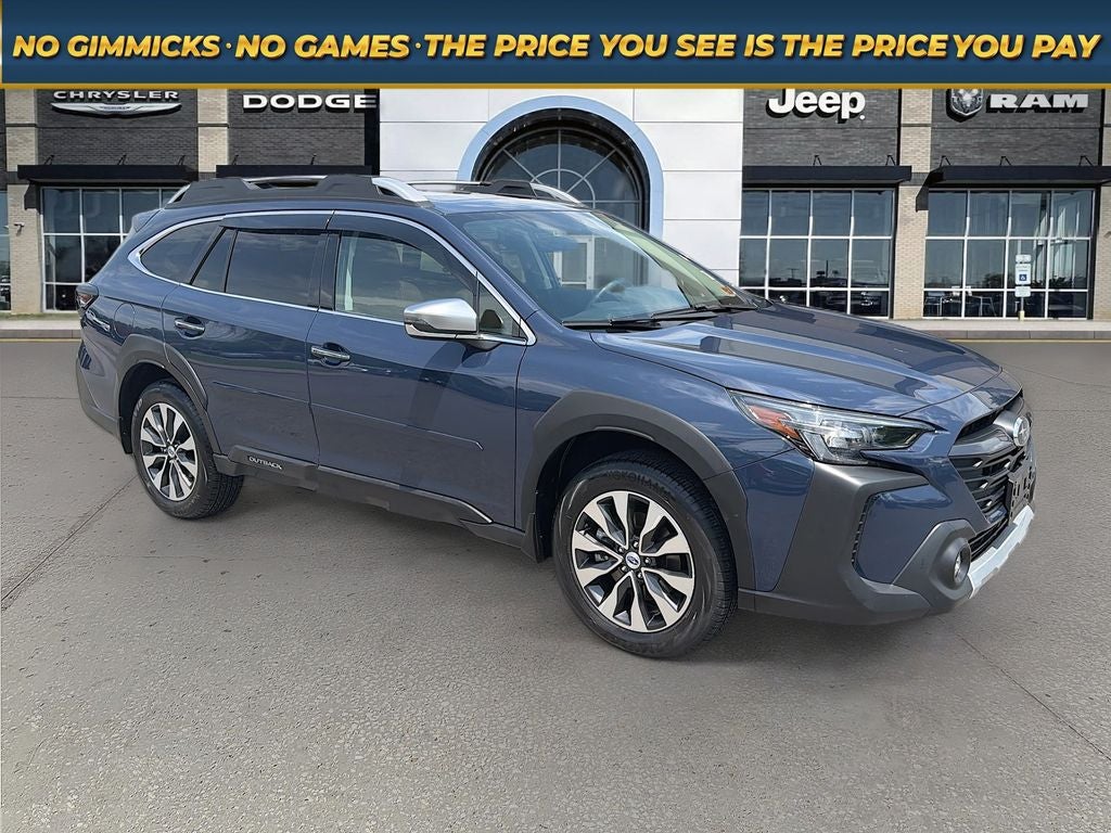 2025 Subaru Outback Touring XT in Cosmic Blue — front three-quarter view