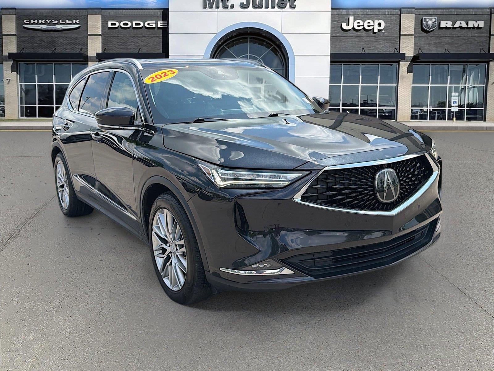 2023 Acura MDX Advance Package in Purple Metallic — front three-quarter view