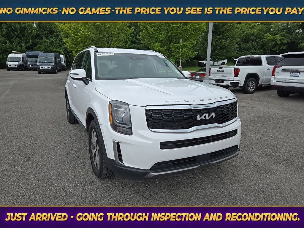 2022 Kia Telluride EX in Glacial White Pearl — front three-quarter view