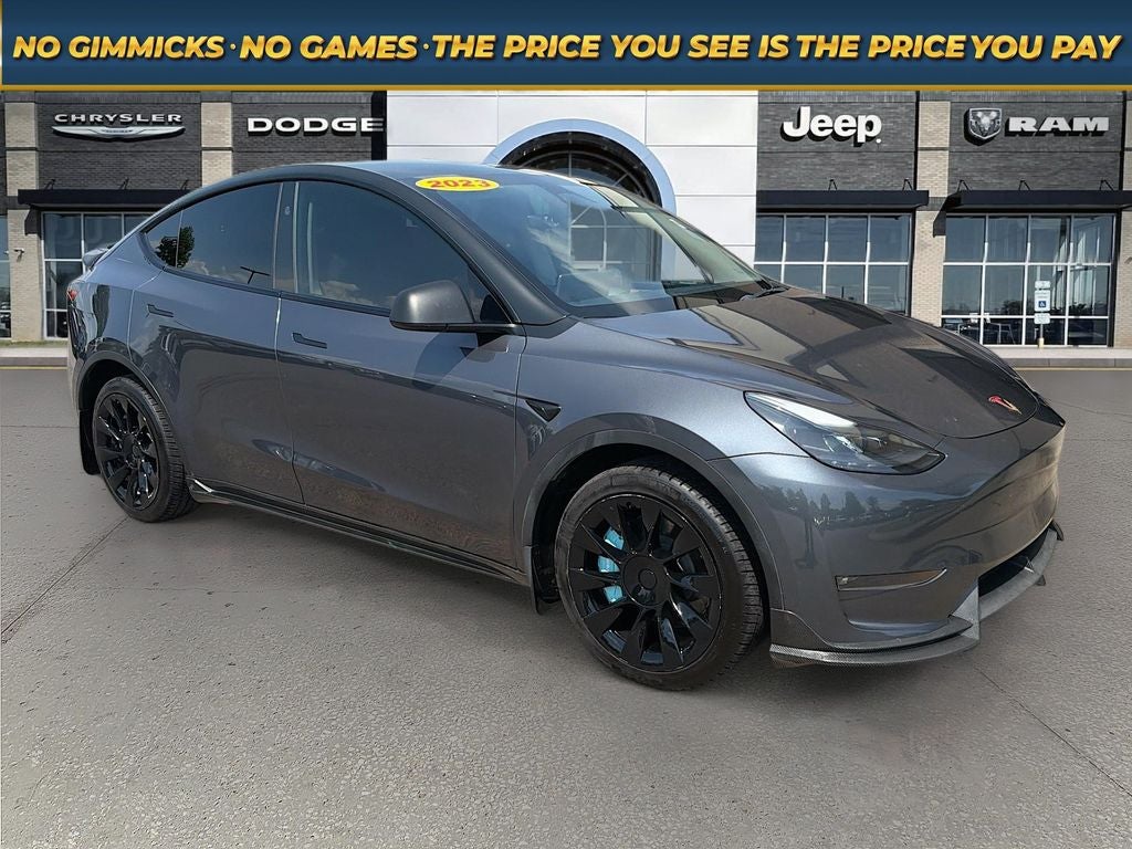 2023 Tesla Model Y Long Range Dual Motor All-Wheel Drive in Gray — front three-quarter view