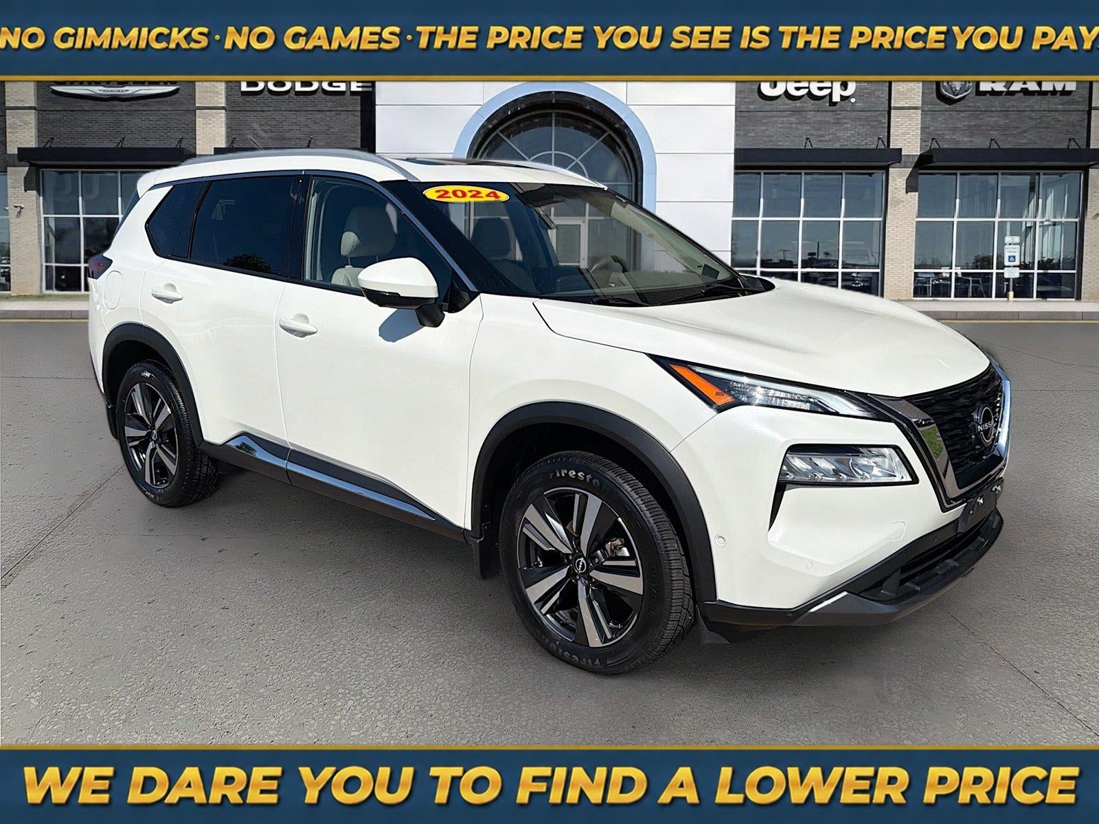 2023 Nissan Rogue SL Intelligent AWD in Pearl White Tricoat — front three-quarter view